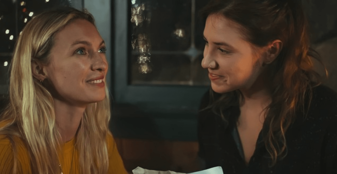 two women looking at each other