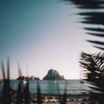 view of gray rock formation on body of water