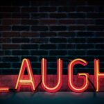 Laugh neon signage lesbian comedians