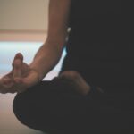 person at meditation event