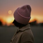 woman in gray knit cap and gray coat cool hats