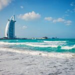 a view of the burj al arab hotel from the beach