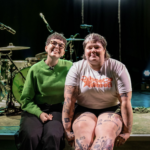 Hanni & Clara from ARXX sat on a stage