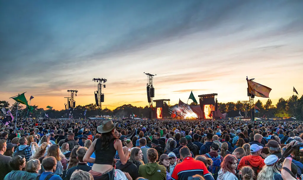 Roskilde Festival Crowds view of the stage at sunset