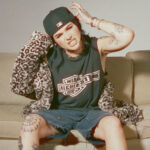 Chloe Star on a sofa