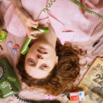 Woman on the phone ina. pink shirt