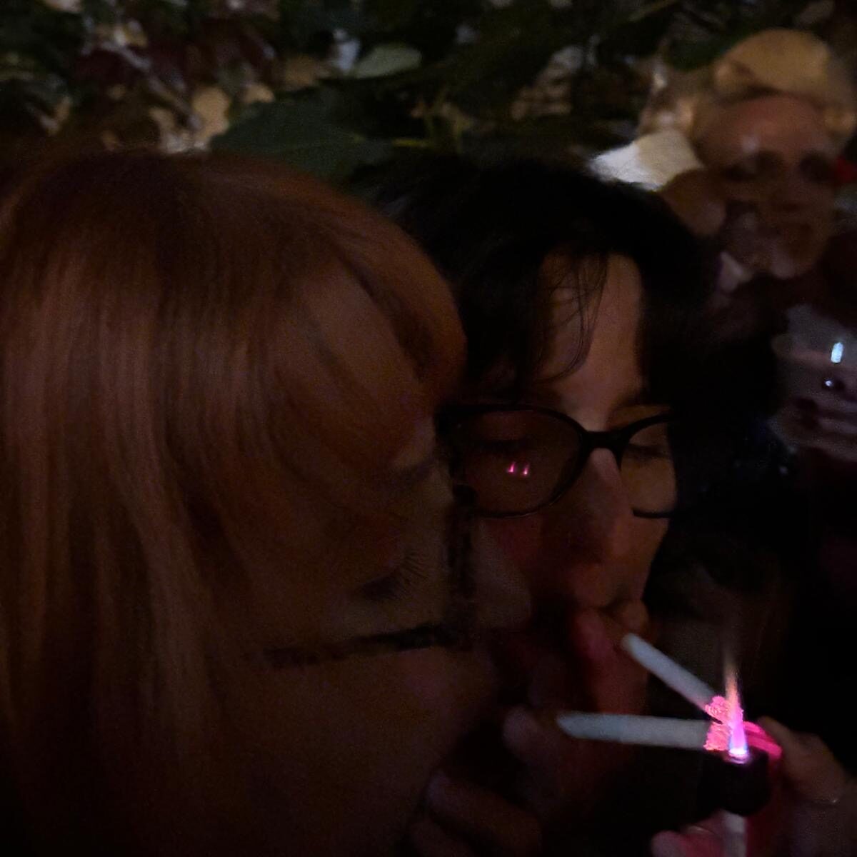 two people smoking