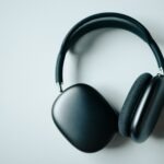 black wireless headphones on white desk