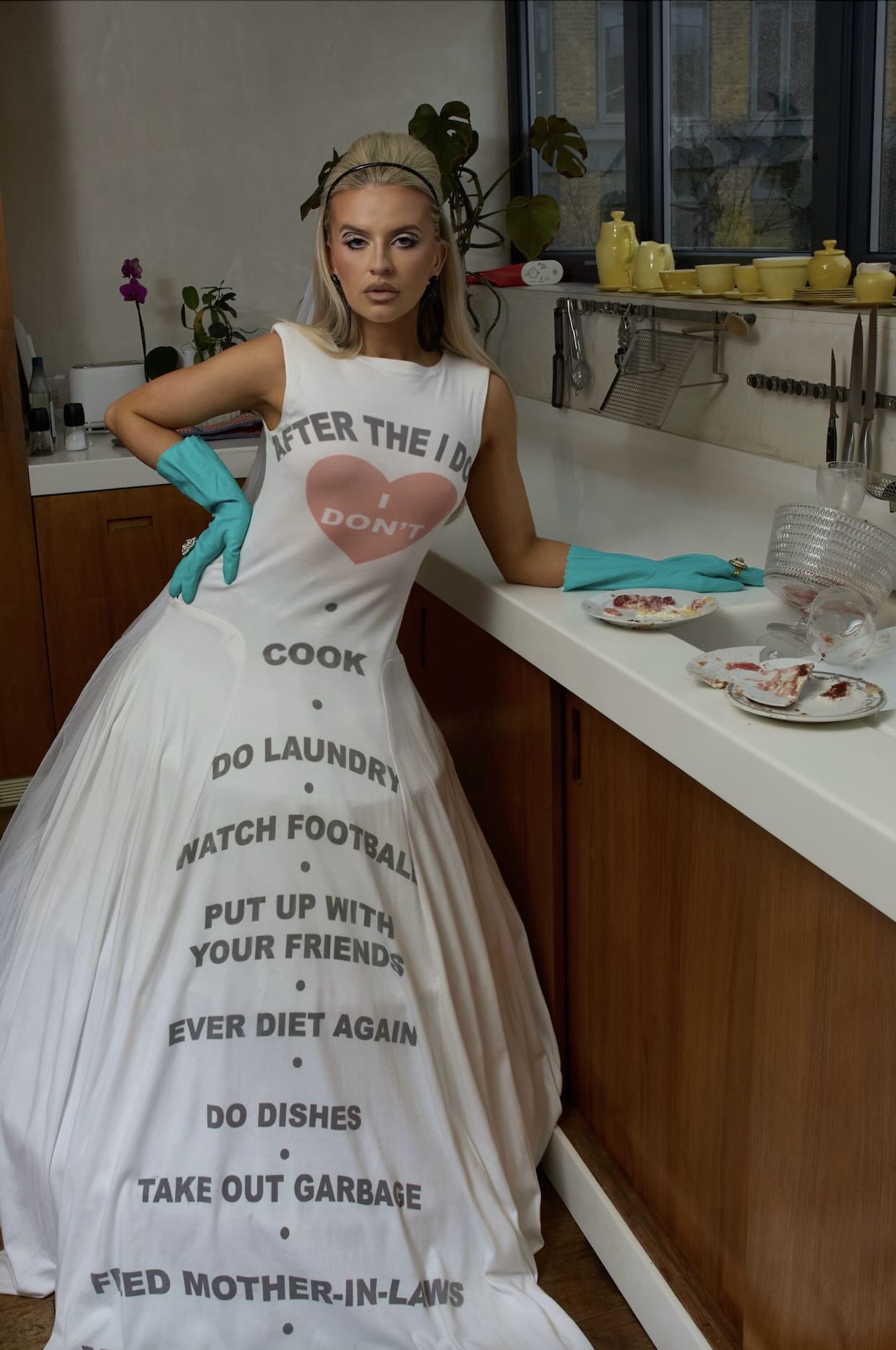 Georgia Wood wearing a dress with writing on it