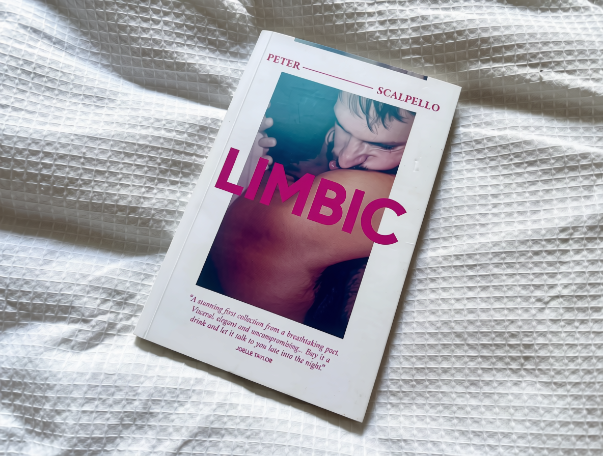 LIMBIC book on a bed cover