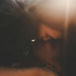 couple kissing photograph