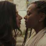 two women about to kiss